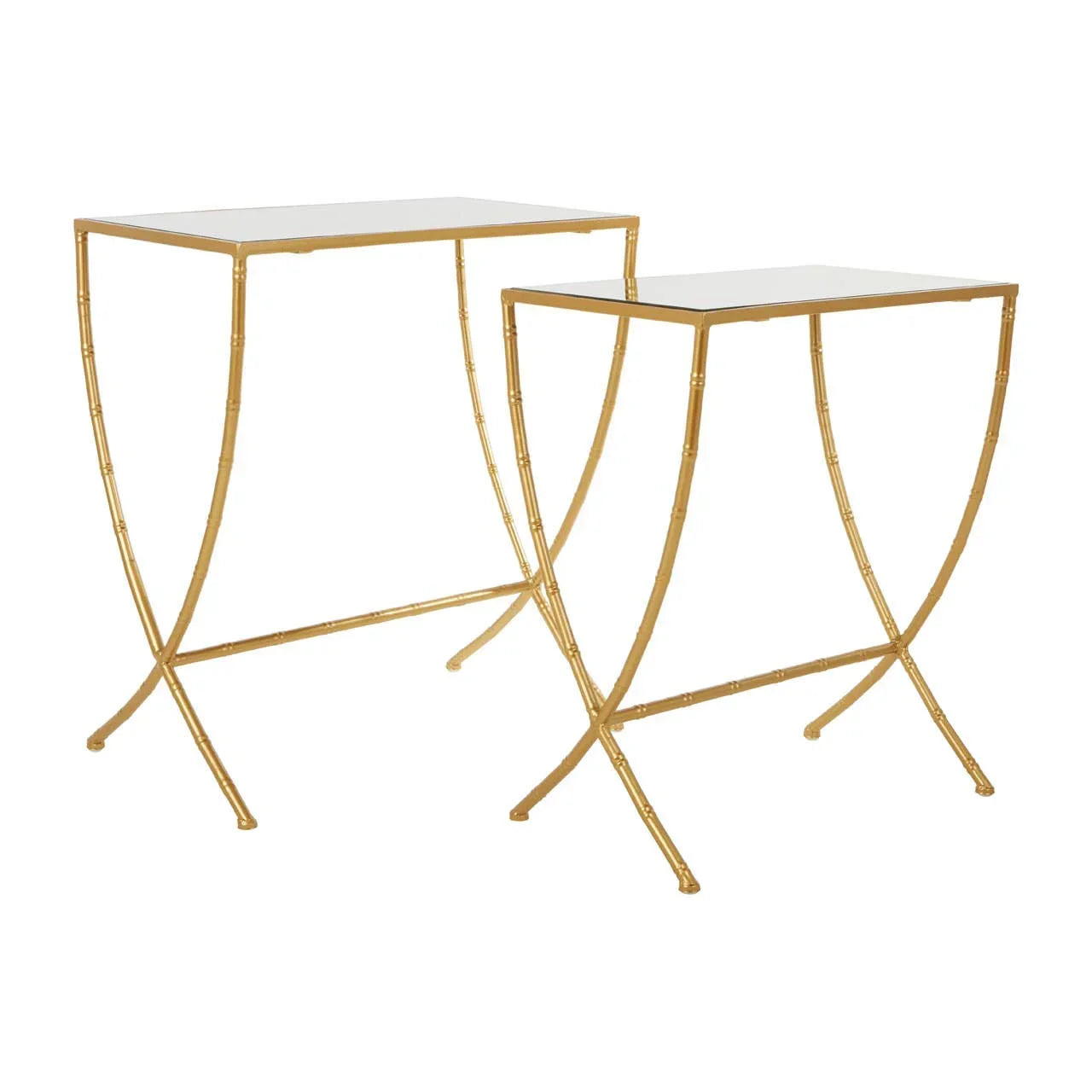 Gold metal and glass nesting tables set with curved legs on white background
