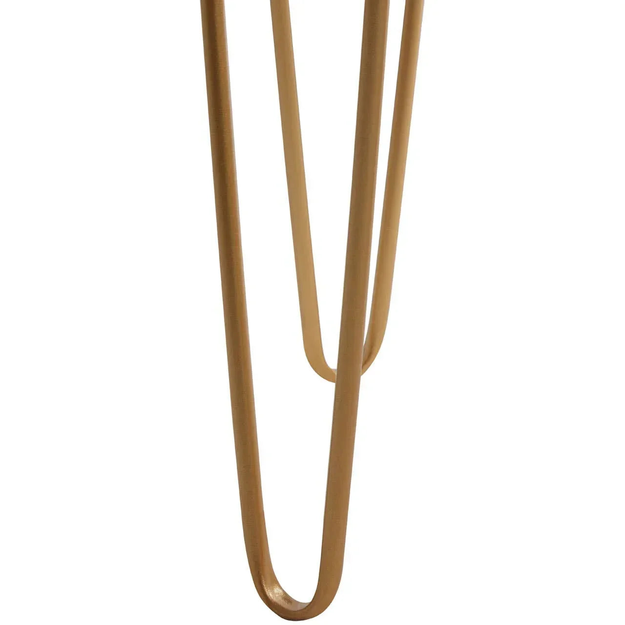 Gold metal hairpin table leg closeup, showing modern furniture design detail