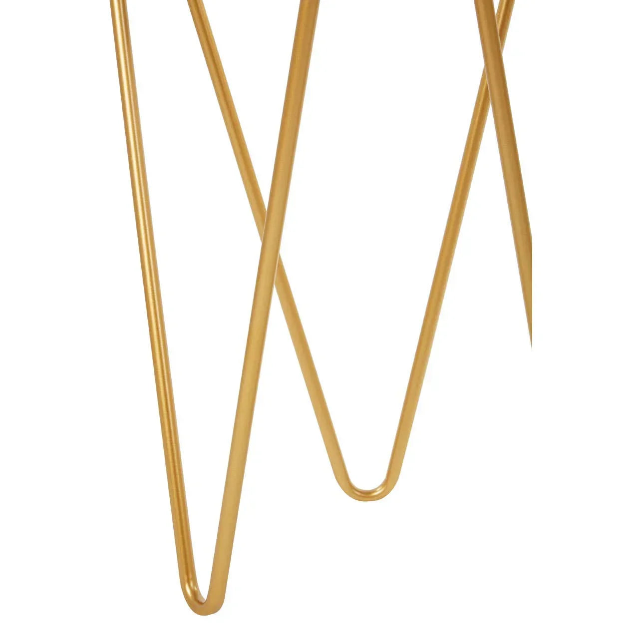 Gold metal hairpin legs on a modern furniture table against white background