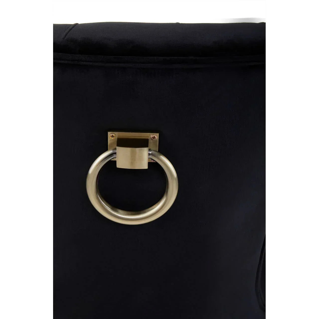Black chair back with gold metal handle ring detail