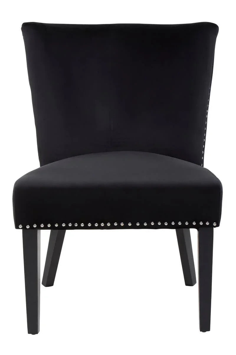 Black velvet accent chair with studded trim and tapered wooden legs, front view