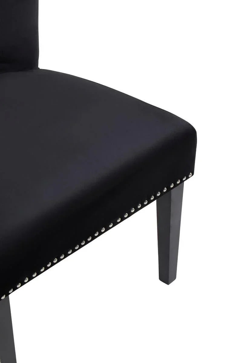 Black velvet dining chair seat with silver stud detailing and wooden legs