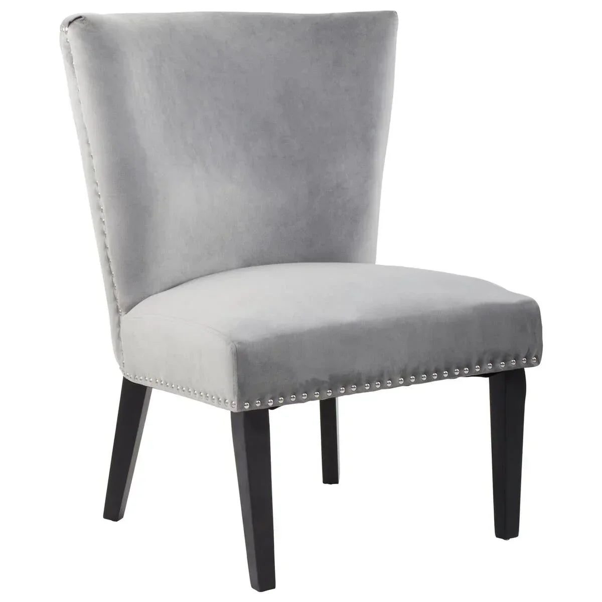 Grey velvet accent chair with black wooden legs and silver nailhead trim