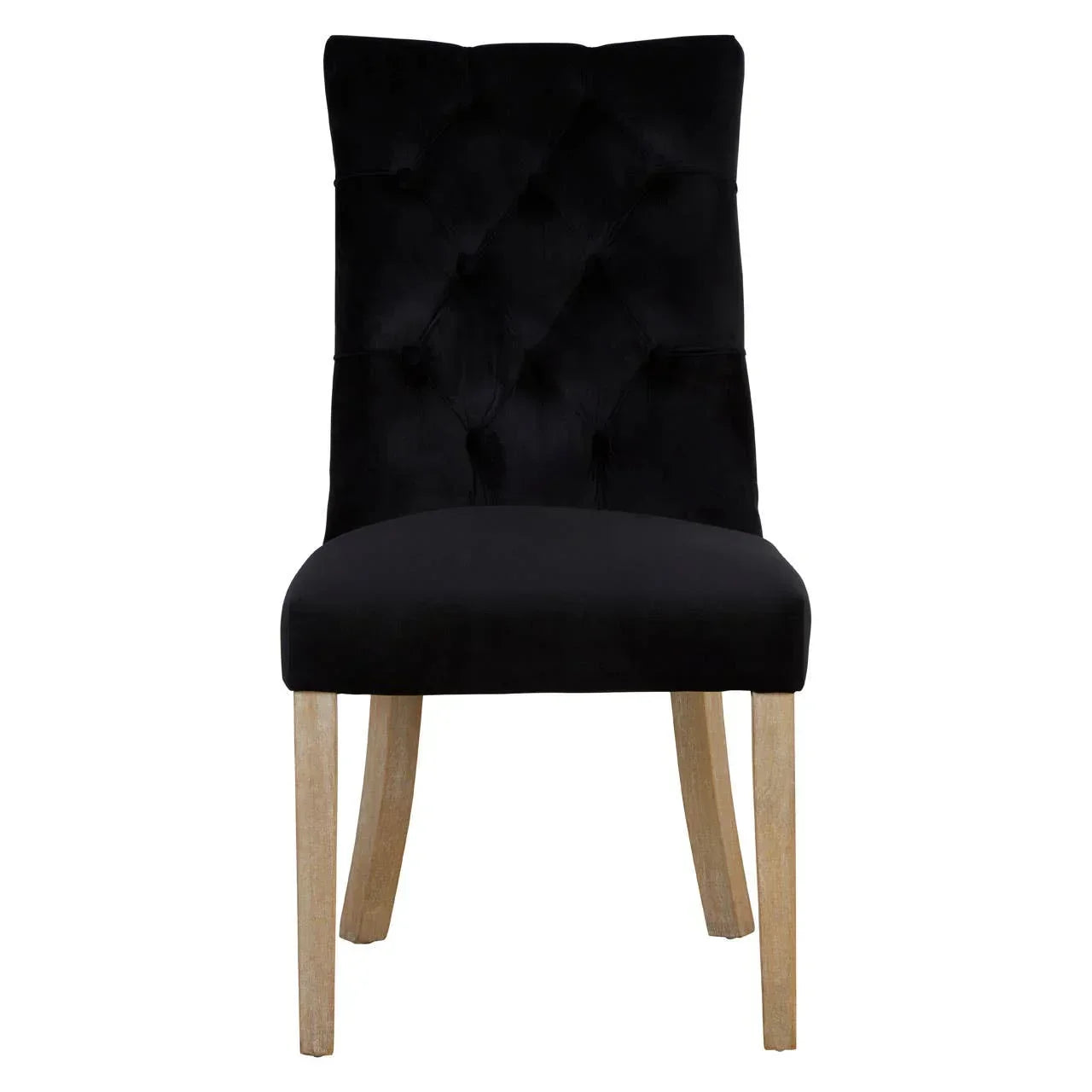 Black velvet dining chair with tufted backrest and light wood legs, front view