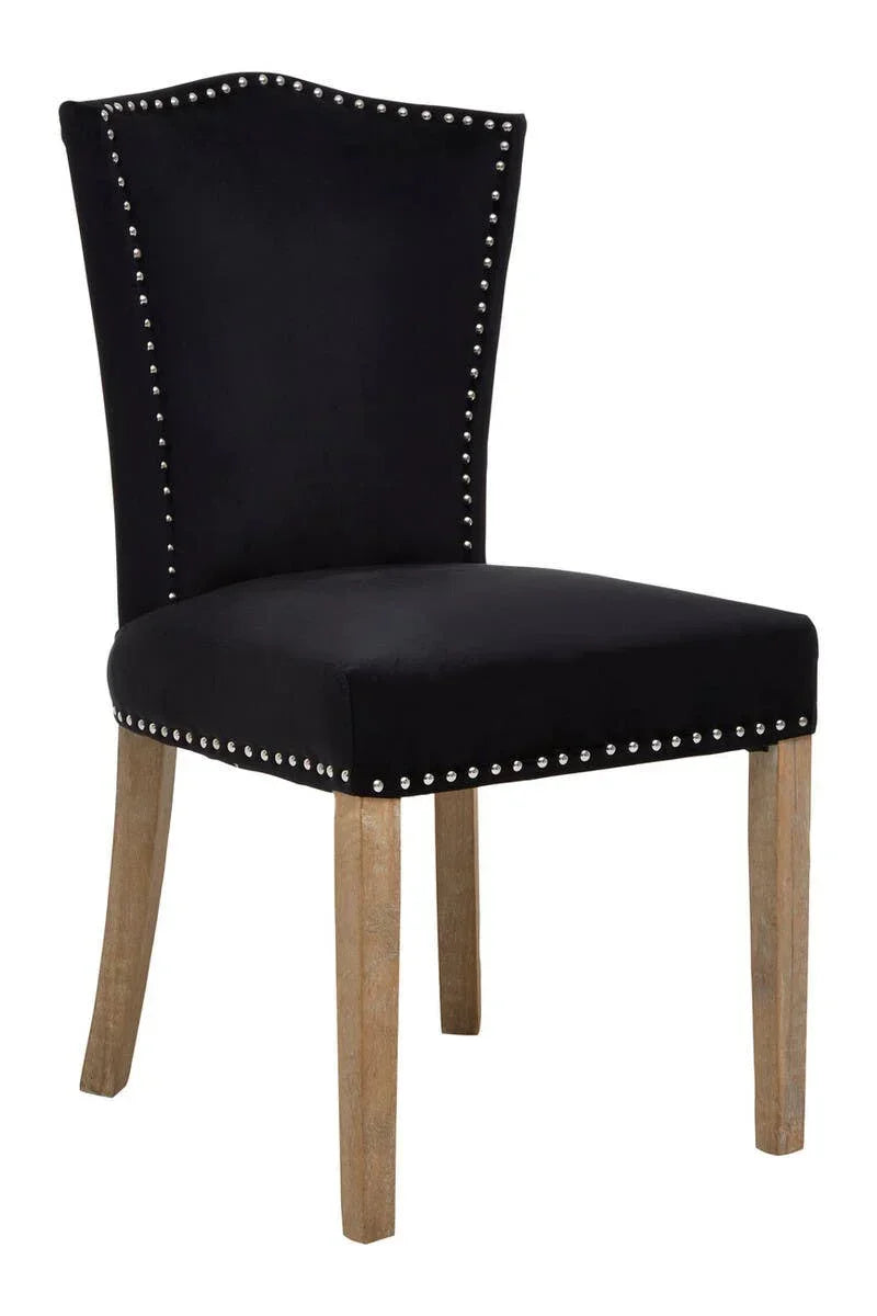 Black dining chair with studded trim and light wooden legs, front angled view