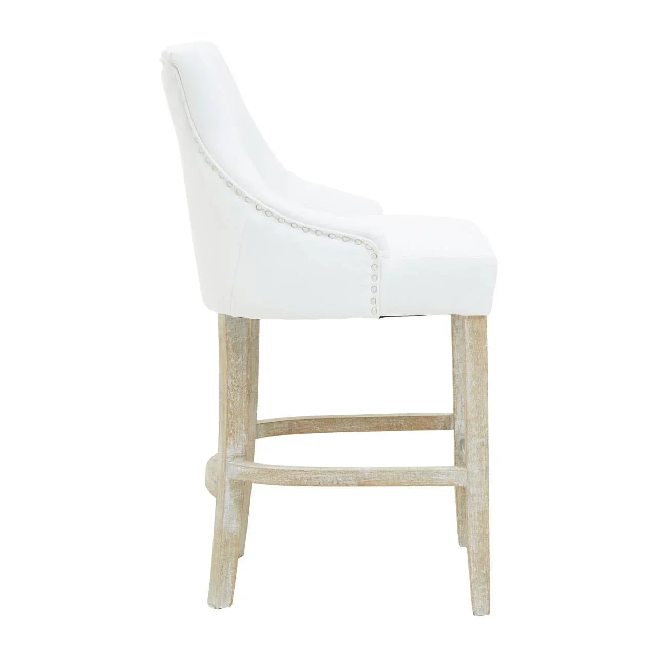 White upholstered bar stool with nailhead trim and light wood legs, side view