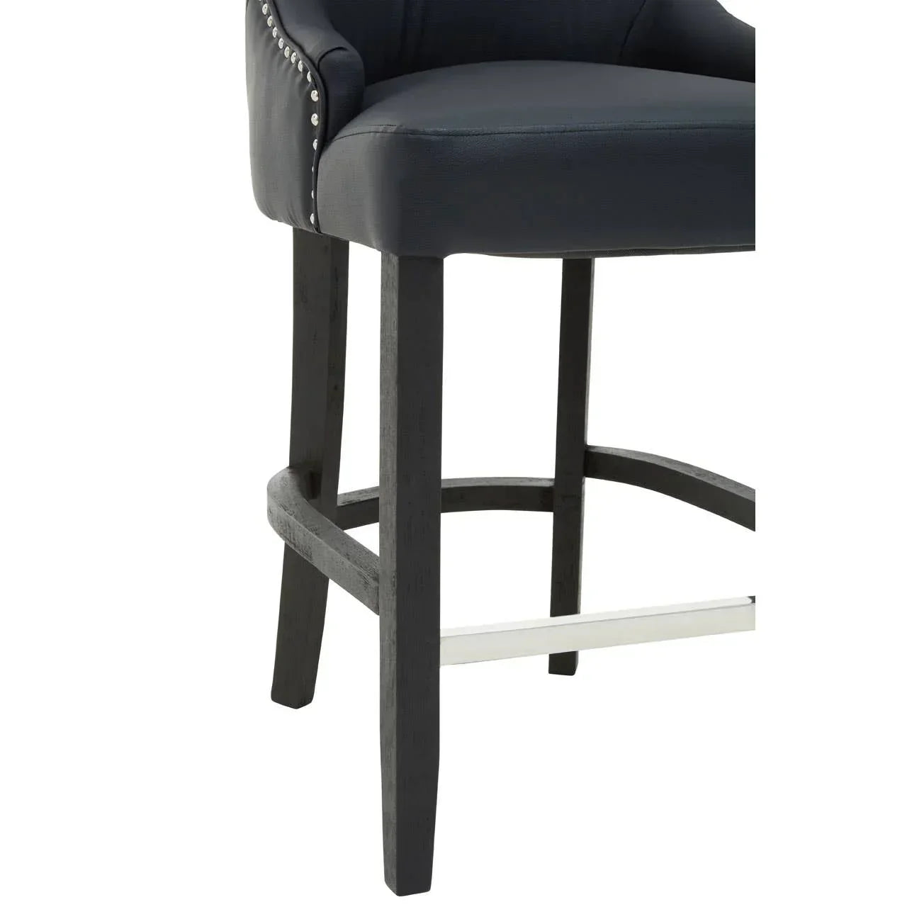 Black bar stool with cushioned seat, metal footrest and nailhead trim detail