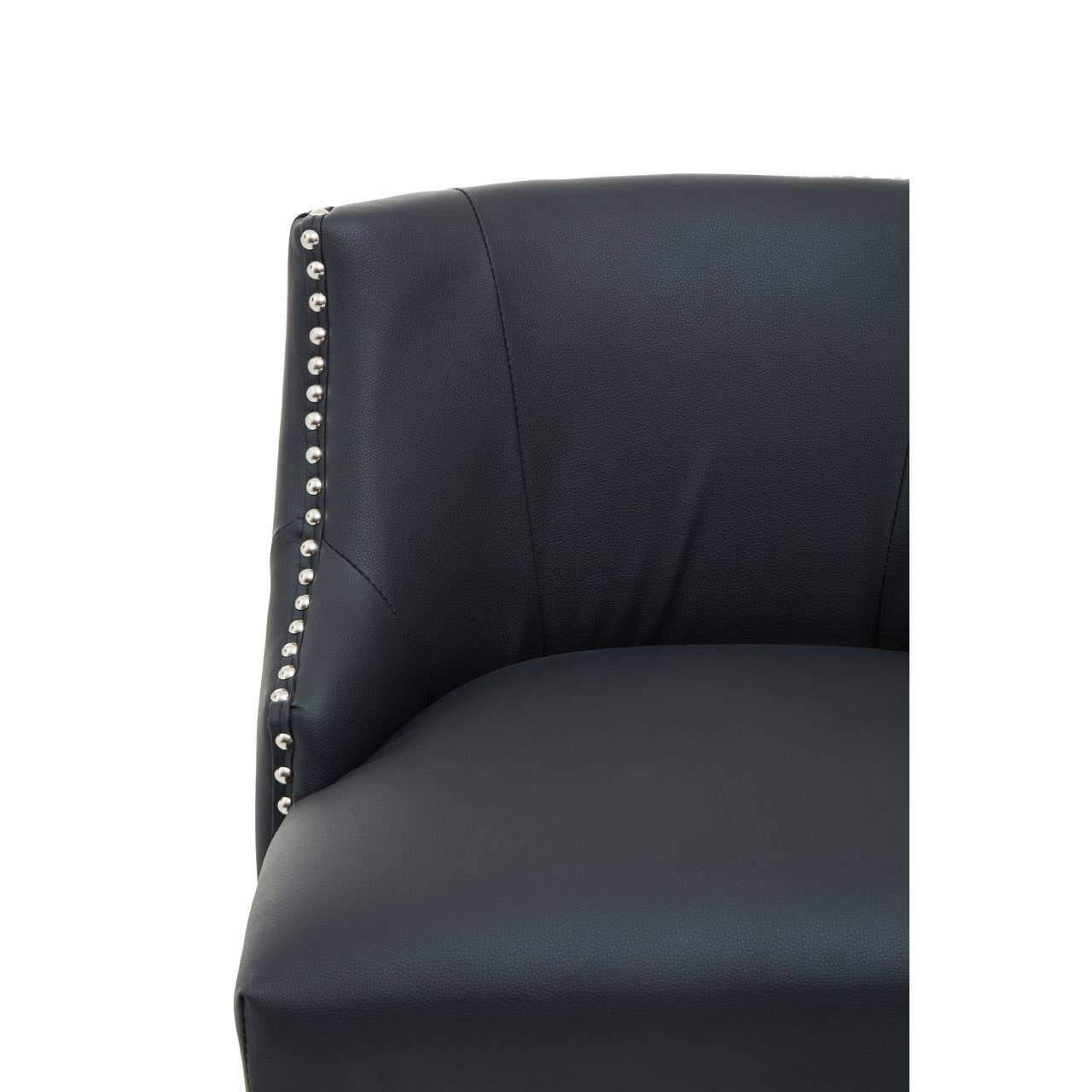 Black leather armchair with silver stud detailing on side and curved backrest