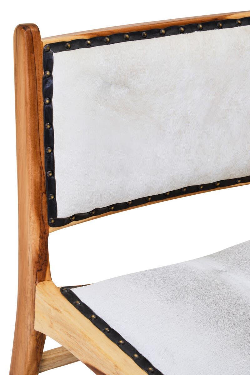 Wooden dining chair with white cowhide seat and backrest, brass stud detailing