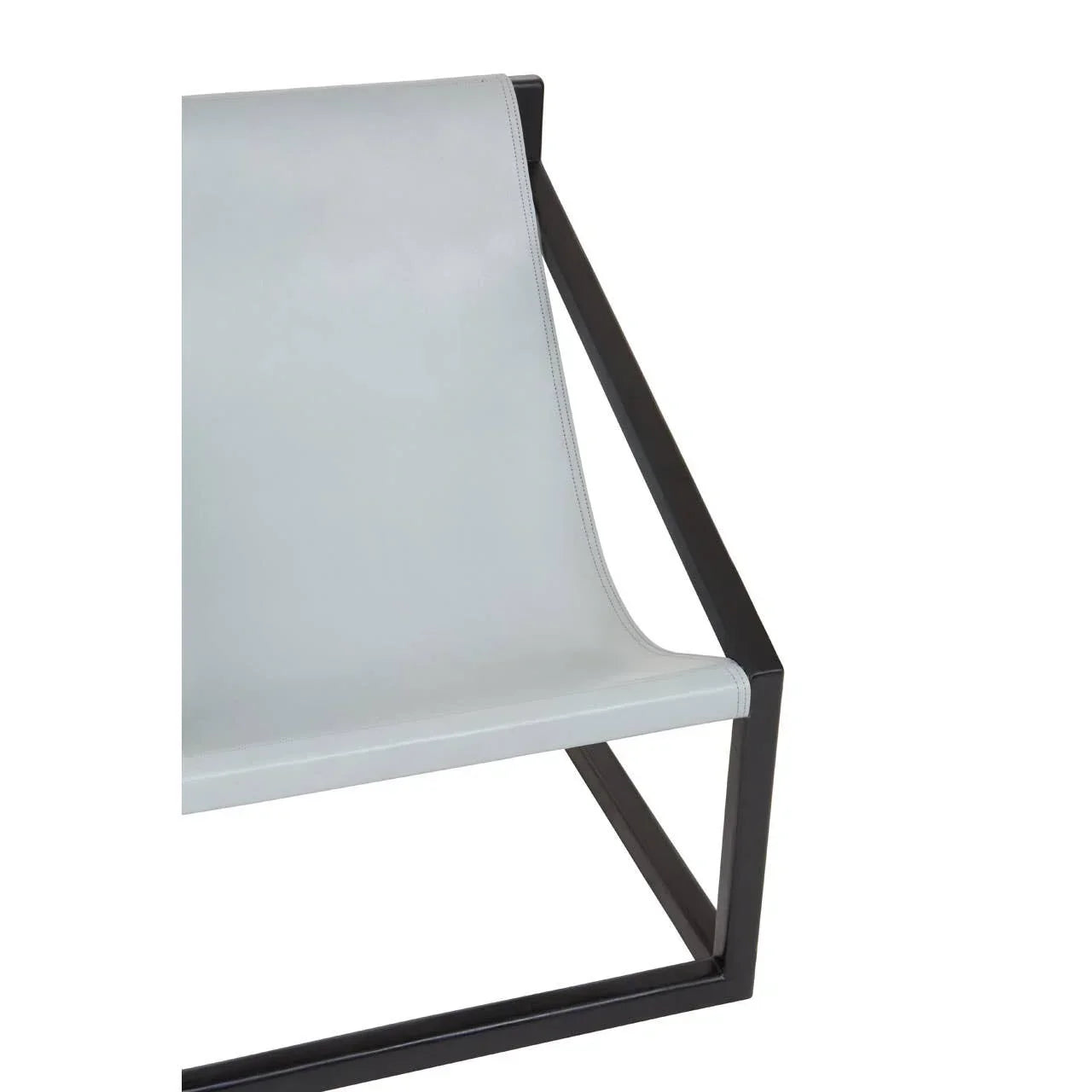 Modern accent chair with white leather seat and black metal frame, side angle view