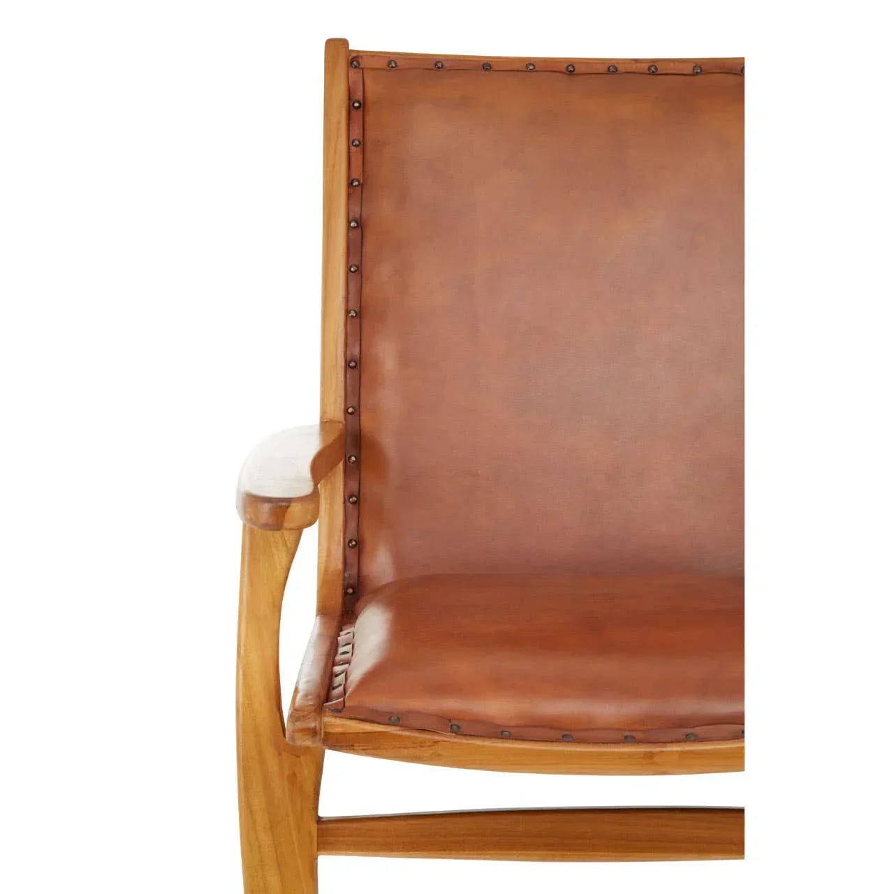 Close view of brown leather armchair with stud detail and wooden frame