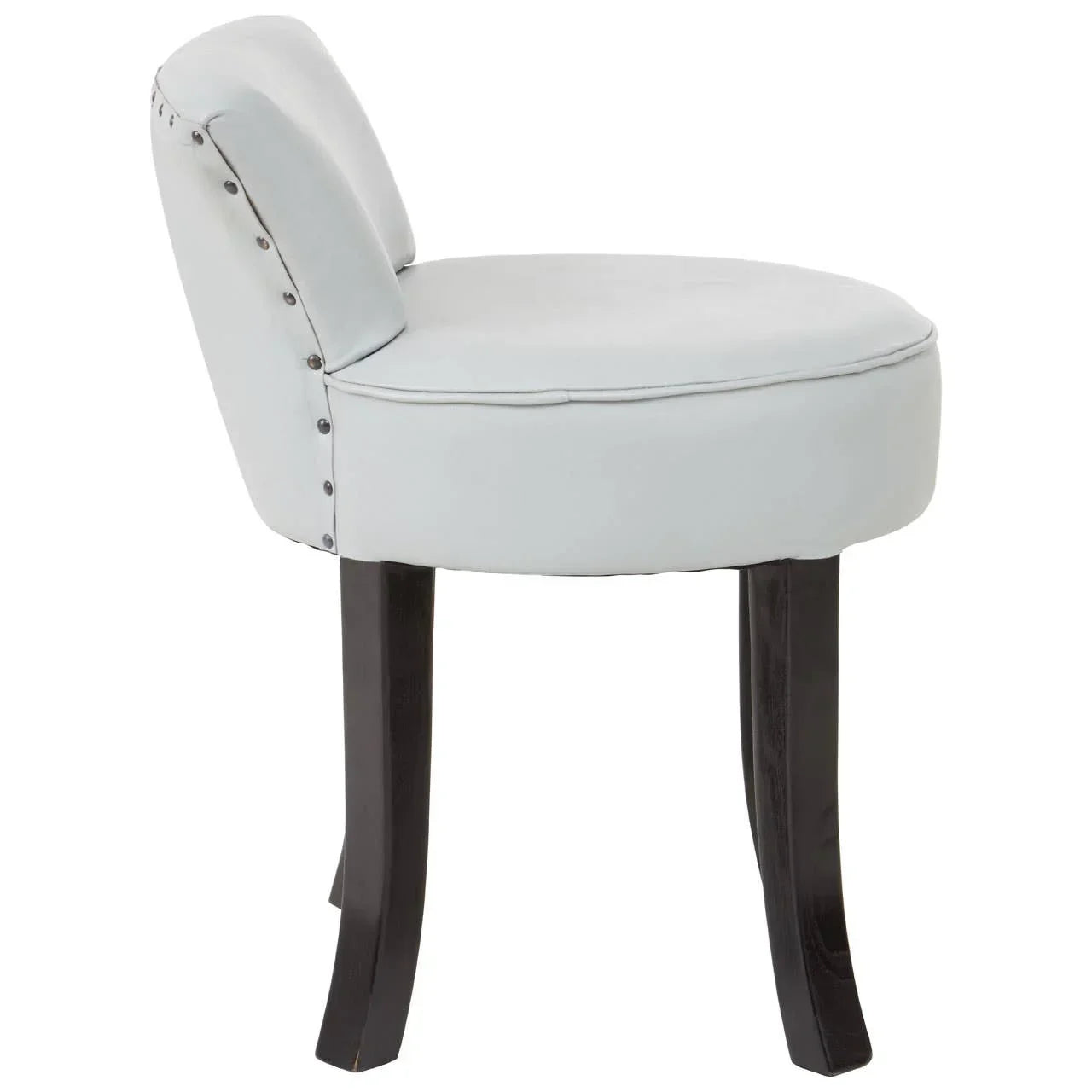 Light grey upholstered accent chair with black wooden legs and studded trim, side view