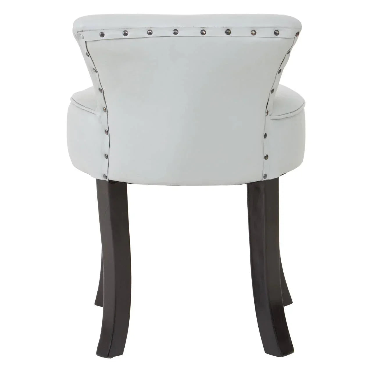 White accent chair with silver stud trim and dark wood legs, rear view