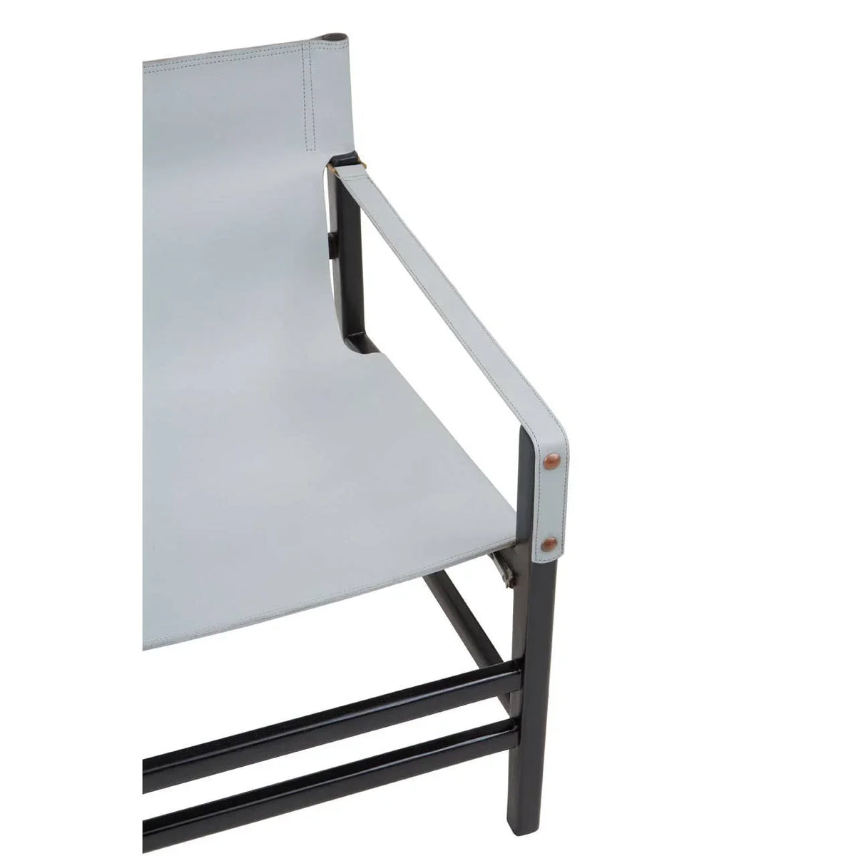 Modern armchair with light grey leather seat and black metal frame, close-up of armrest