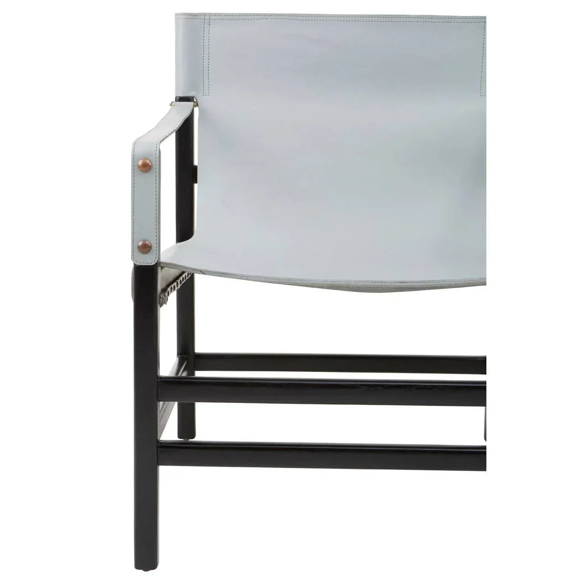 Modern accent chair with black frame and light grey leather seat, partial side view
