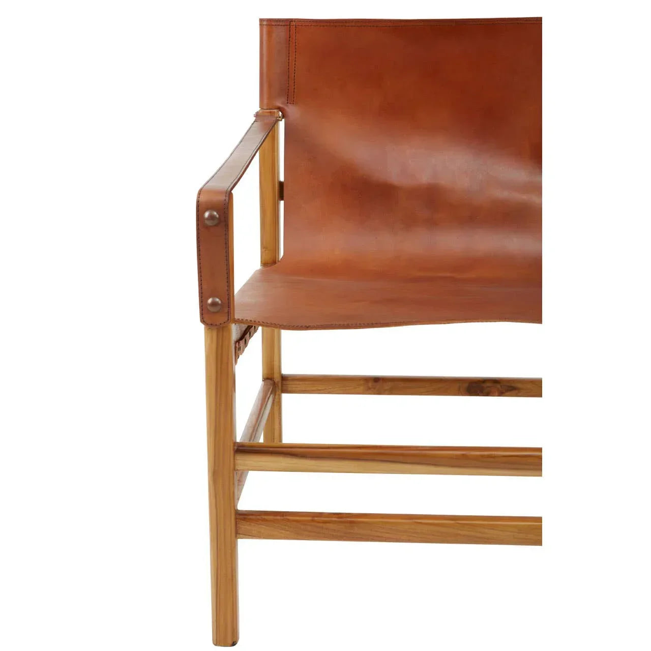 Brown leather armchair with wooden frame, close-up of seat and armrest