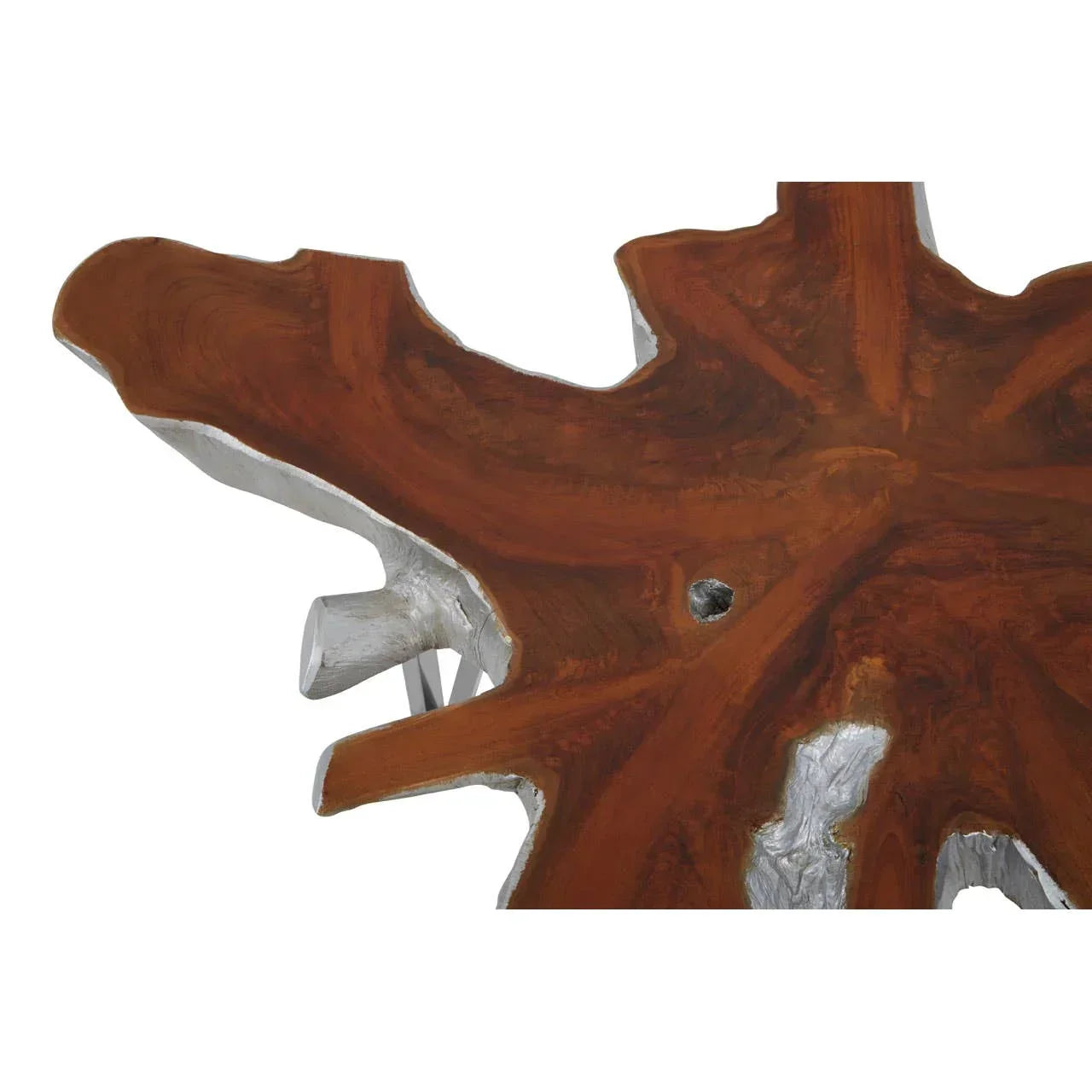 Closeup of wood and silver root coffee table surface with natural edge detail