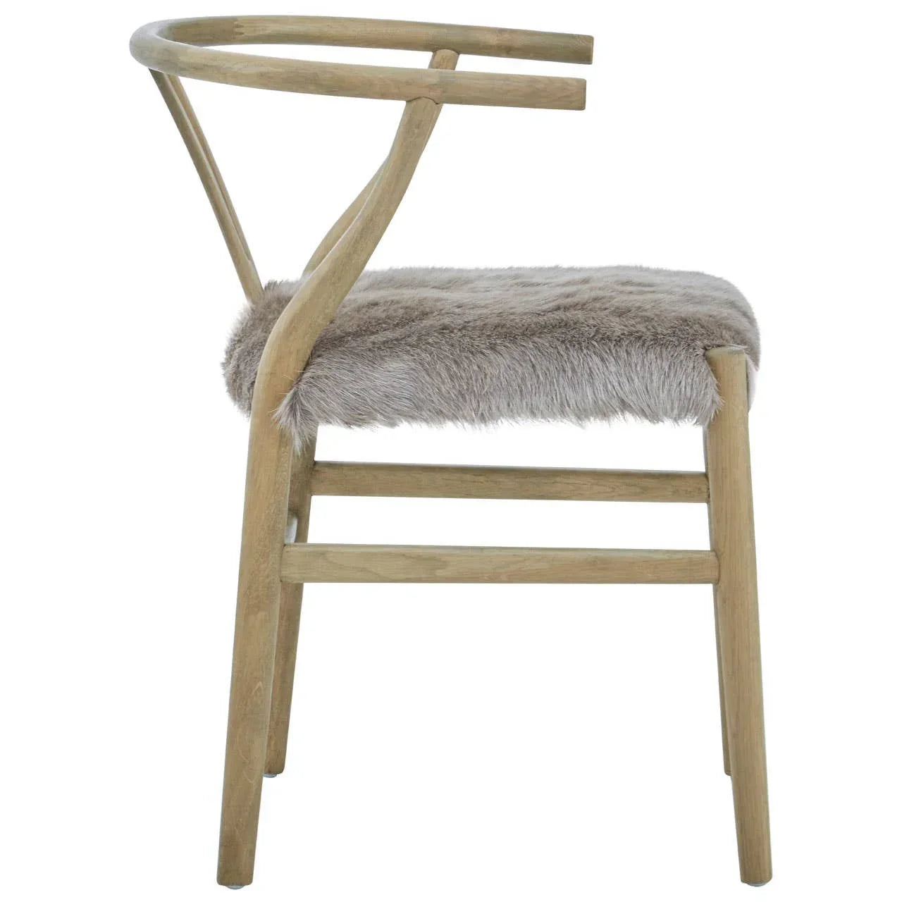 Wooden dining chair with curved back and faux fur seat cushion, side view