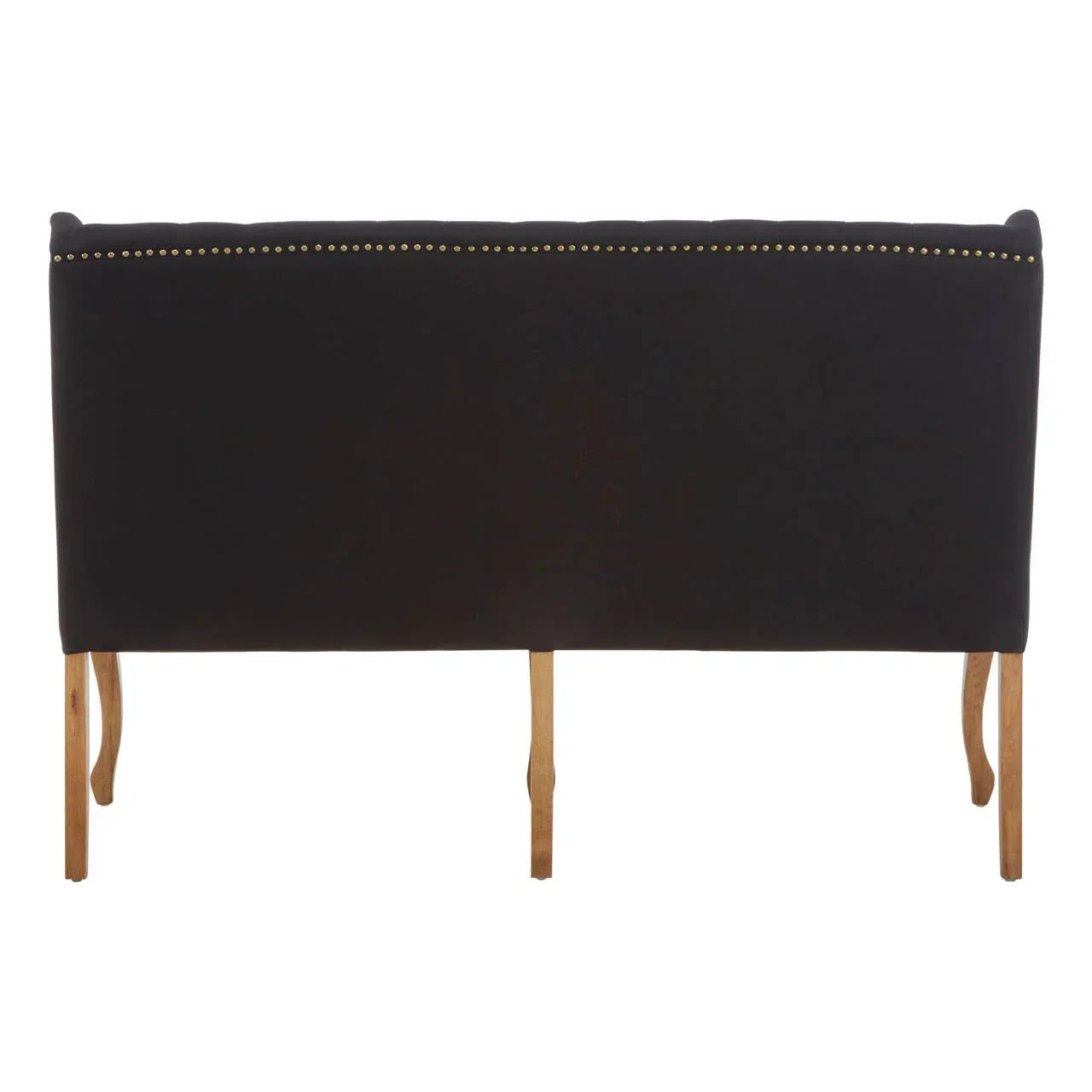 Black upholstered headboard with gold stud detailing and wooden legs, rear view