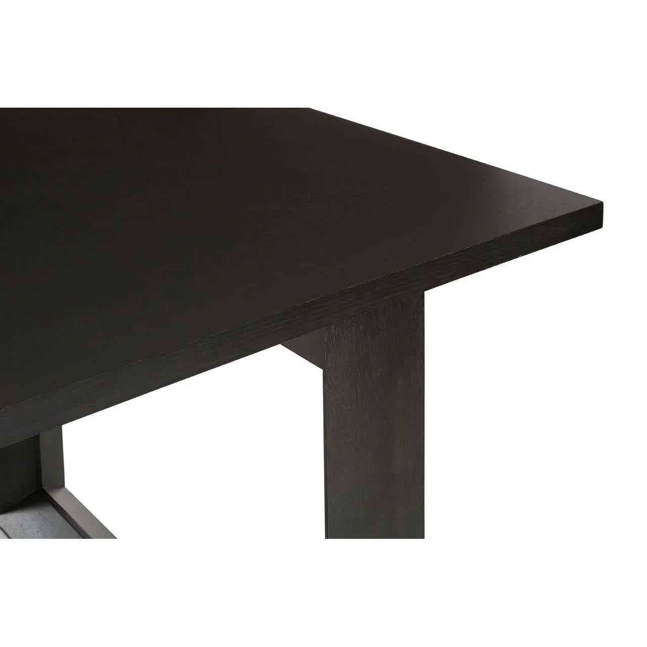 Black wooden dining table close-up showing leg and tabletop details