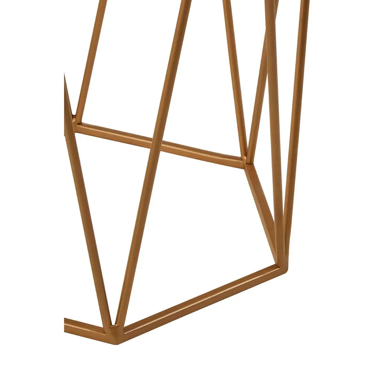 Gold metal table frame with geometric design and angled legs, close-up view