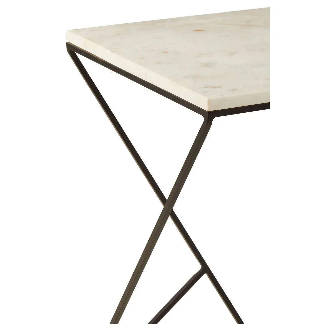 Corner view of marble top table with black metal base and minimalist design