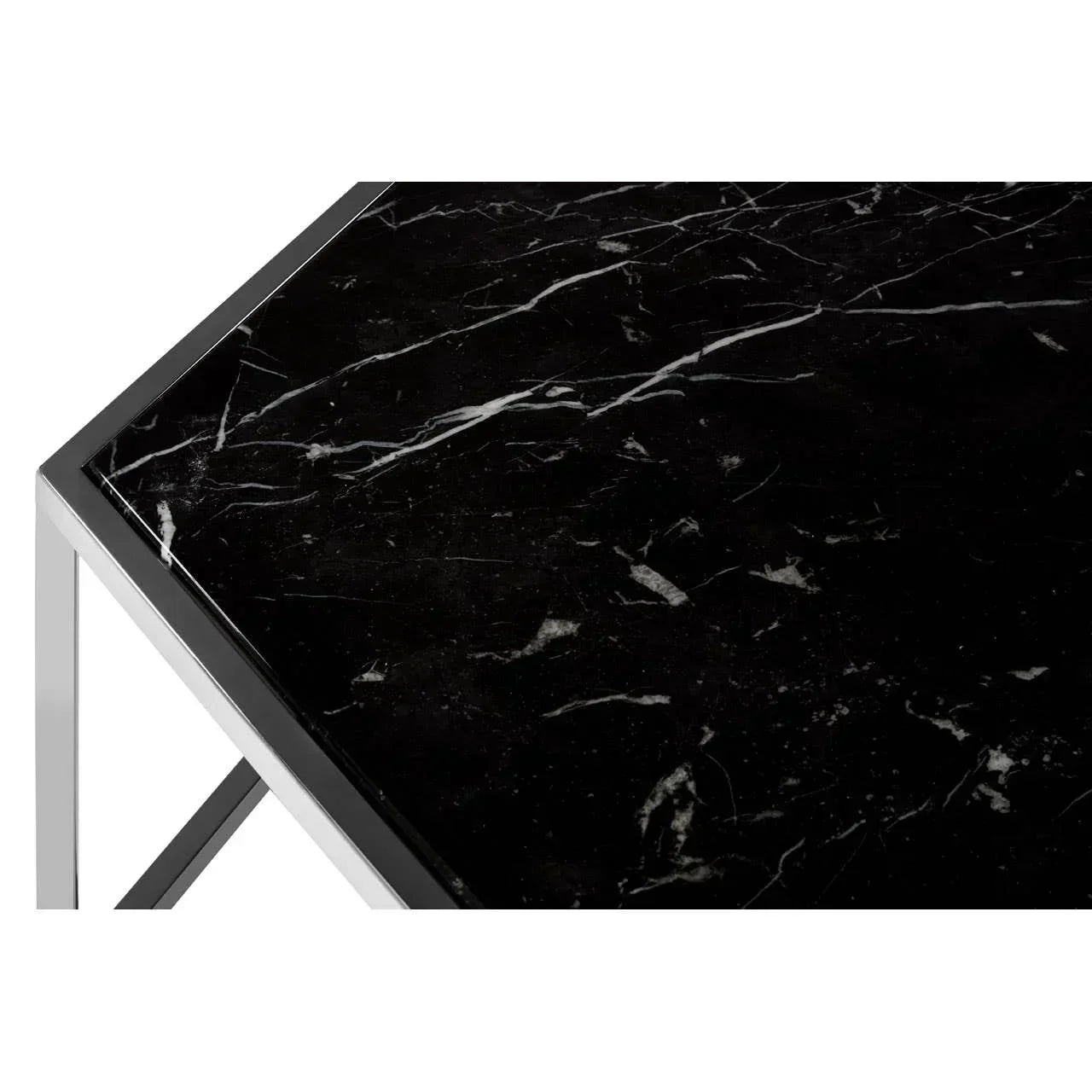 Black marble coffee table top with silver metal frame close-up