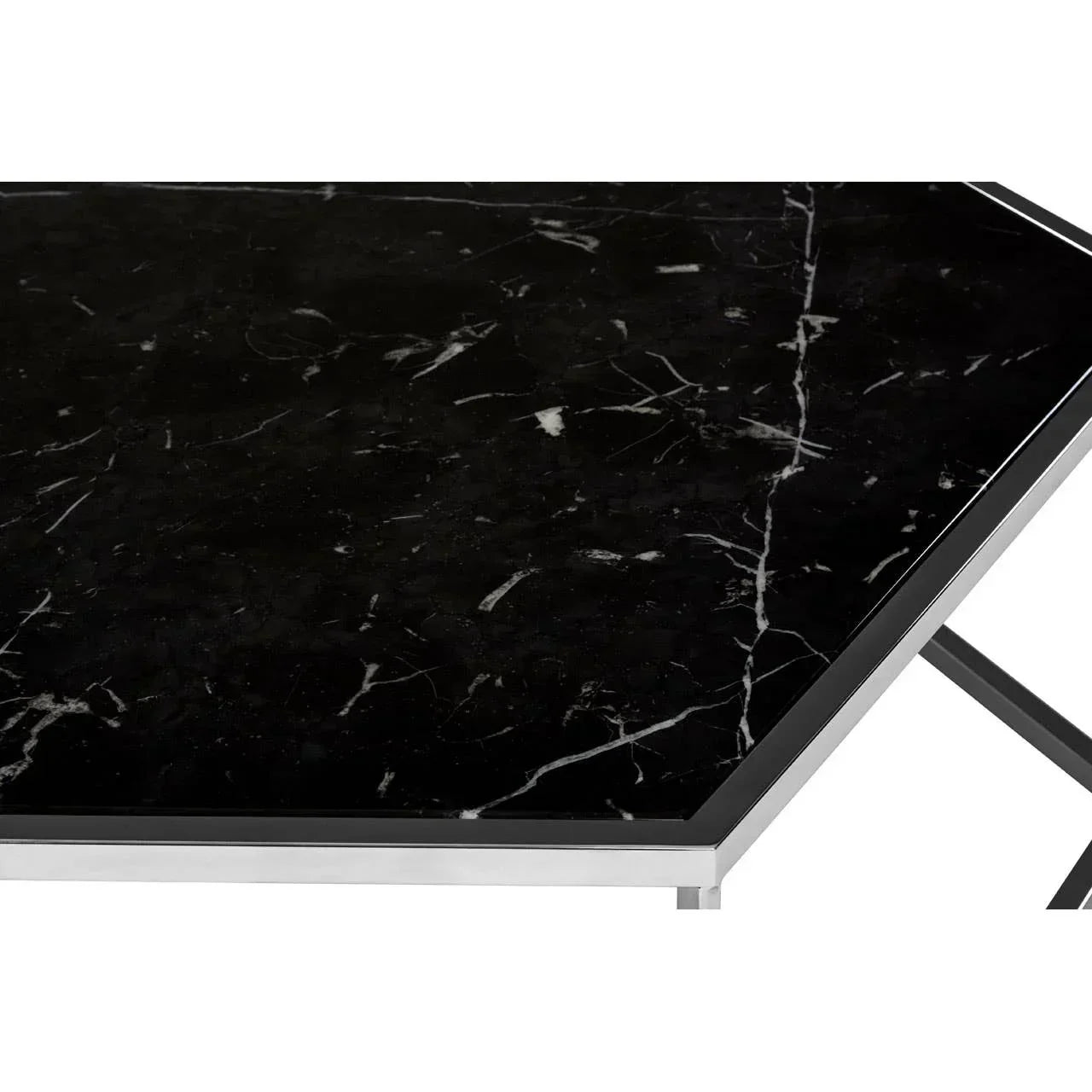 Black marble top coffee table with chrome metal frame, close-up corner view