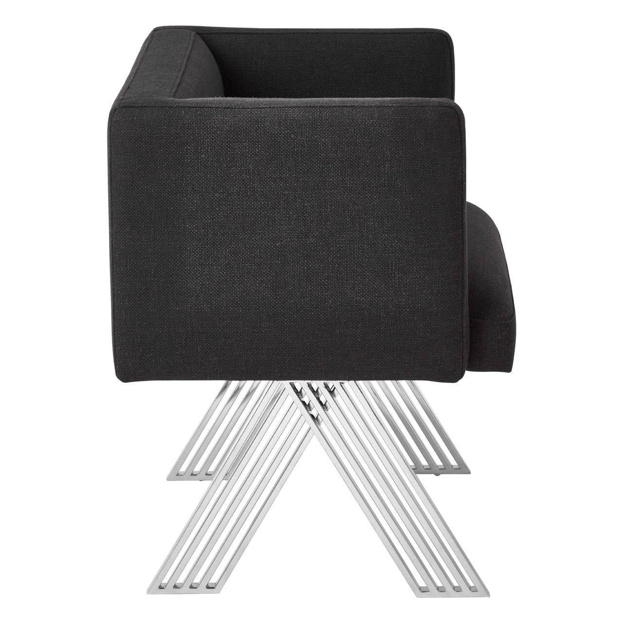 Side view black upholstered armchair with chrome metal base