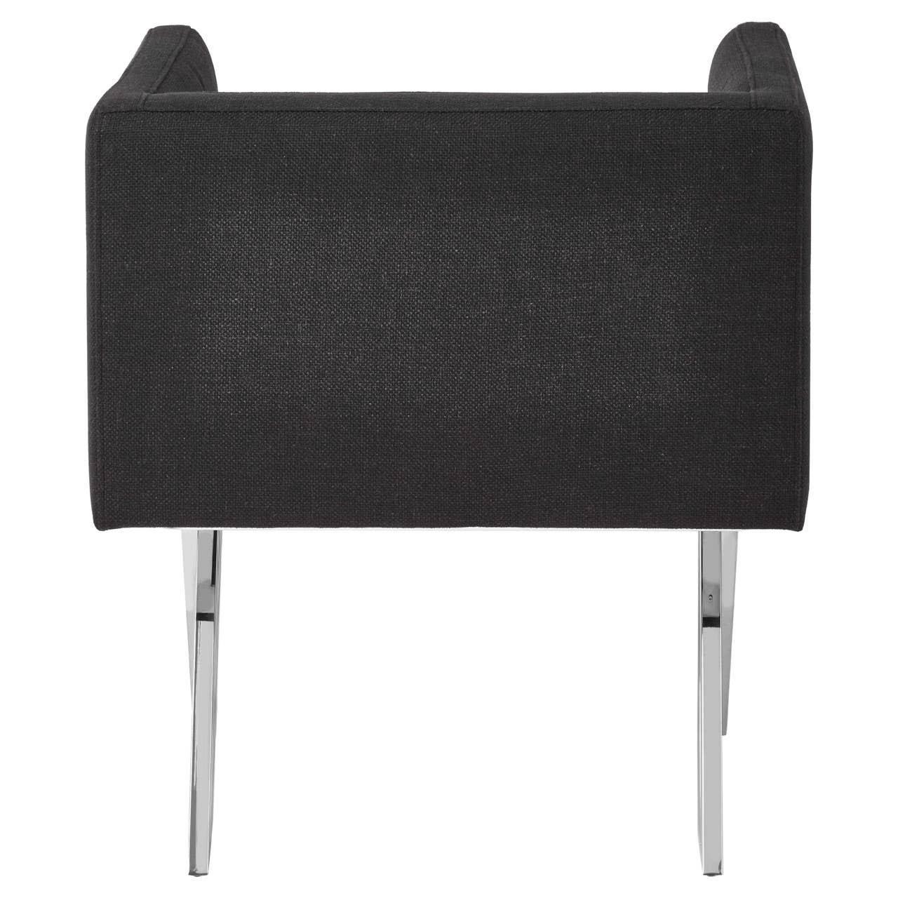 Back view of black fabric accent chair with chrome metal legs