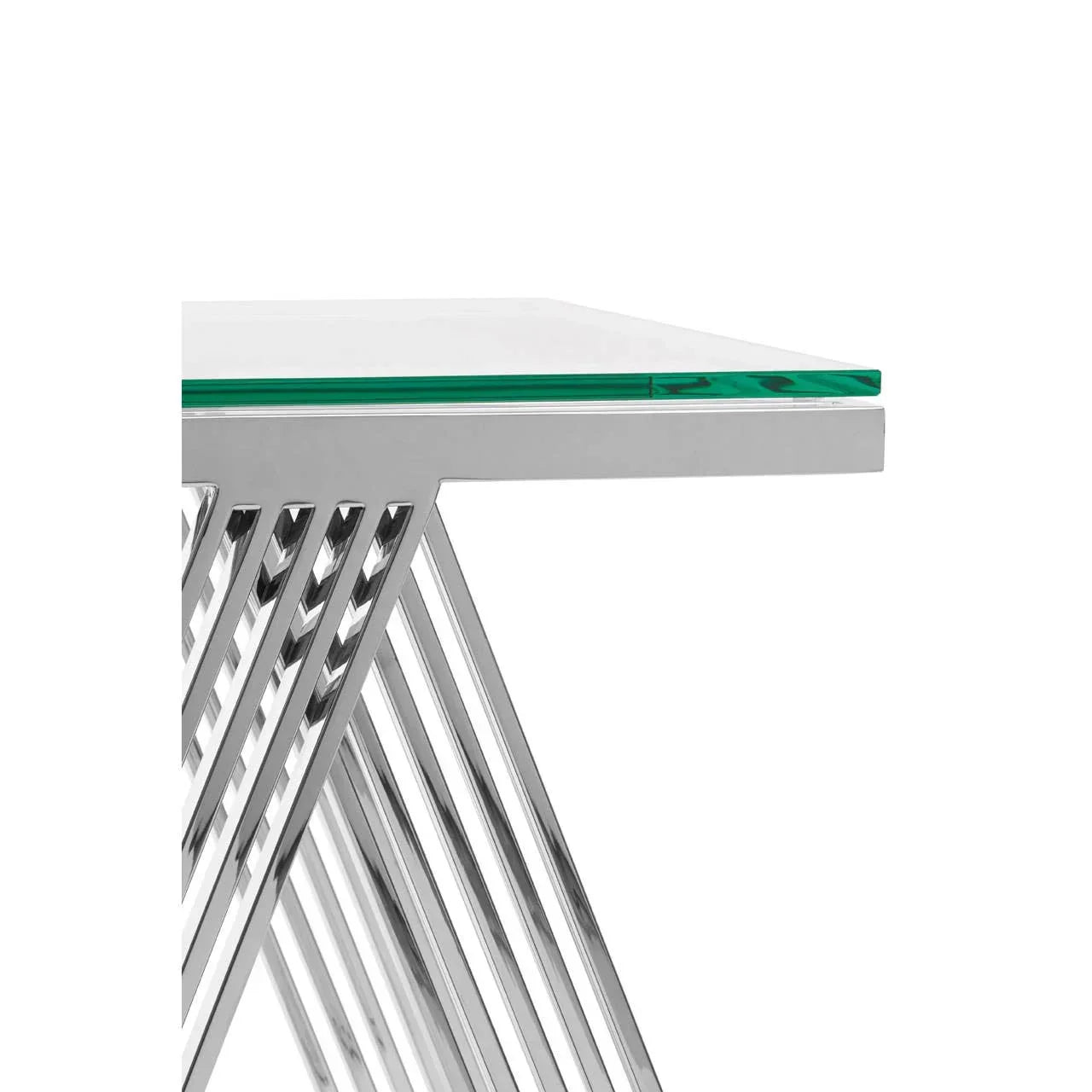 Closeup of glass dining table with chrome metal frame and modern angled supports