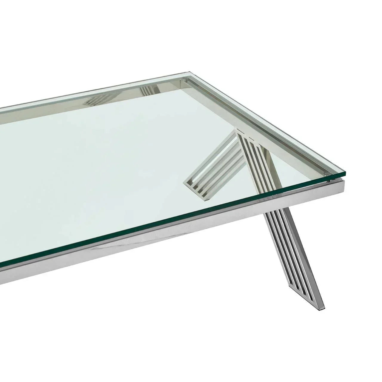 Glass coffee table with chrome metal frame and angled legs