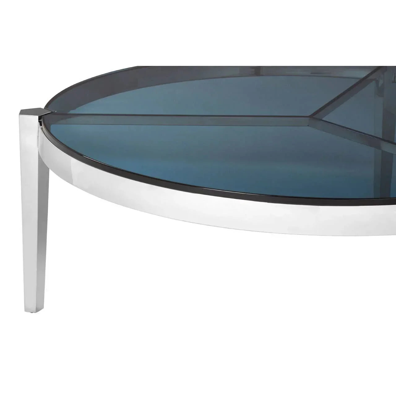 Round glass coffee table with chrome legs and tinted tabletop, close-up angled view