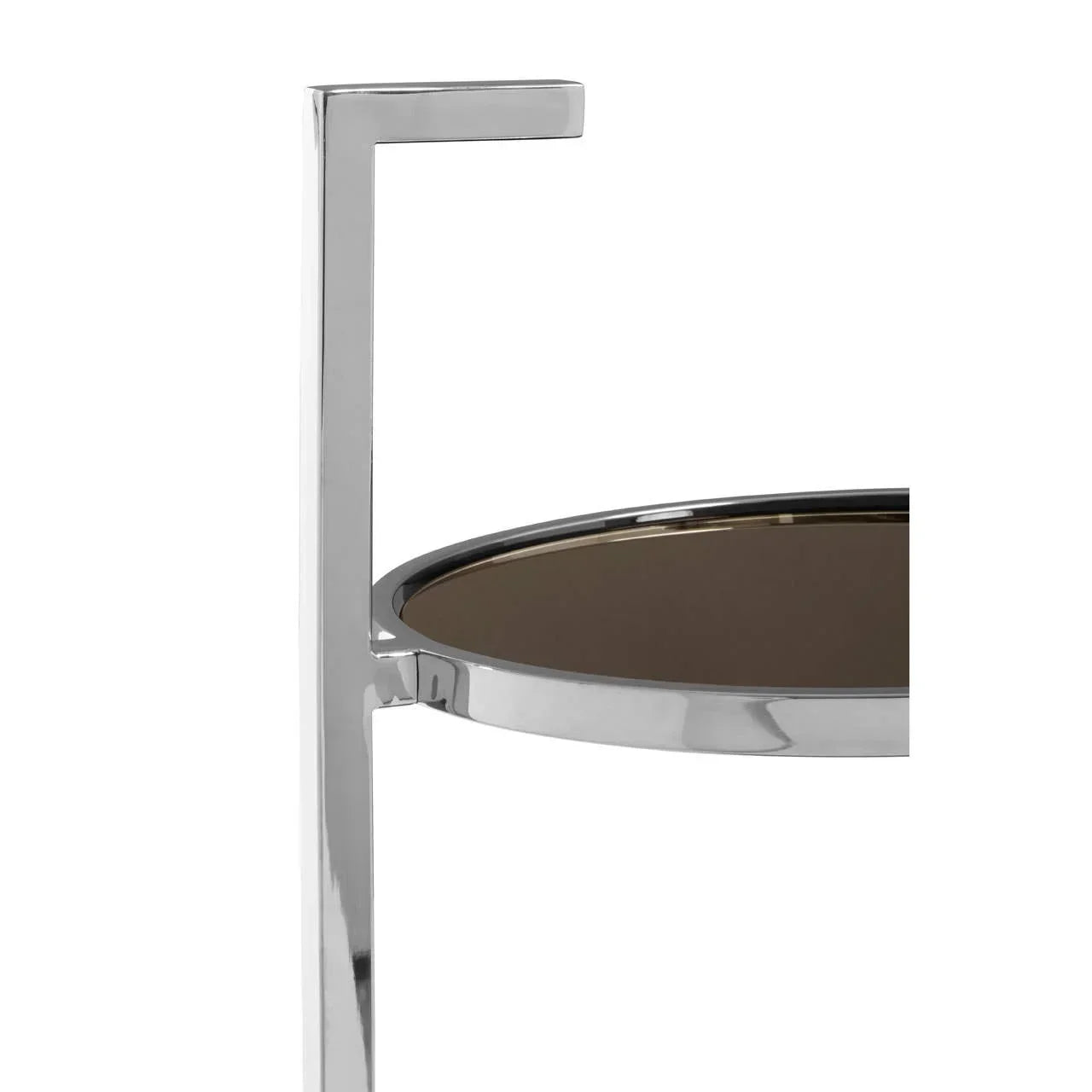 Chrome side table frame with round brown glass top, close-up on corner and rim detail