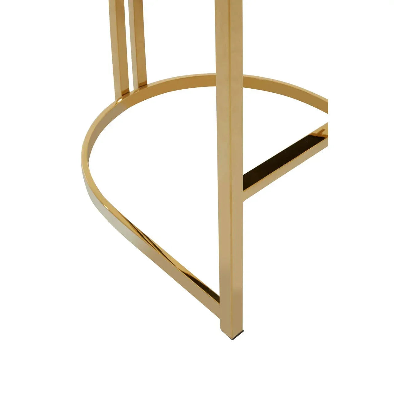 gold metal table base with curved frame and squared legs on white background