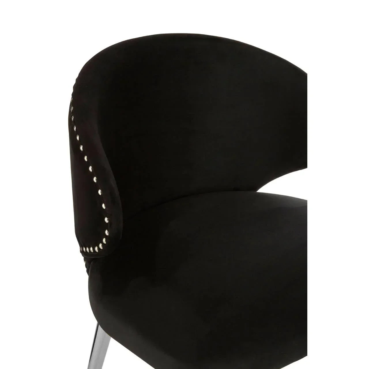 Black velvet dining chair with curved backrest and silver stud detailing