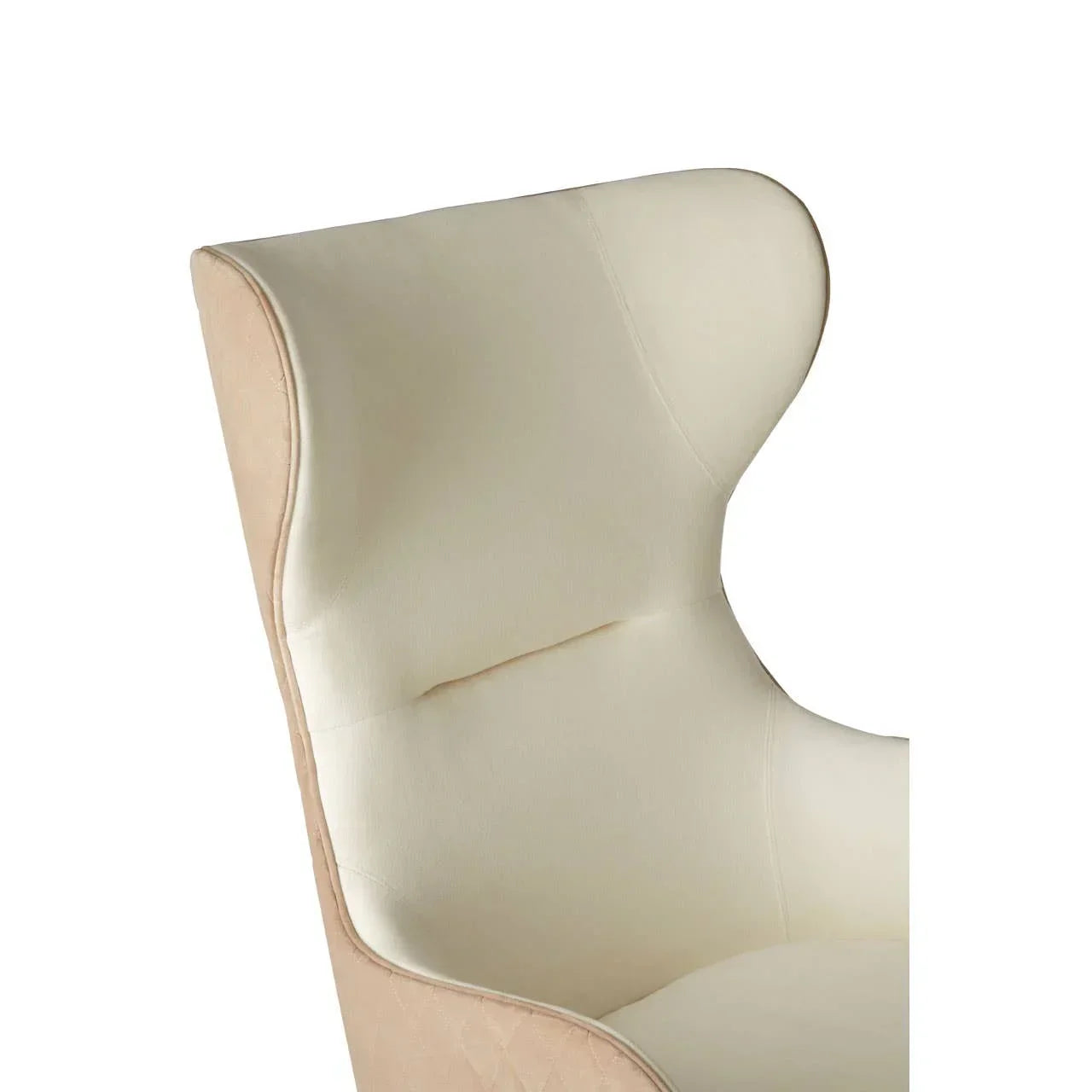 Cream fabric high back armchair with quilted side detail, close-up of backrest