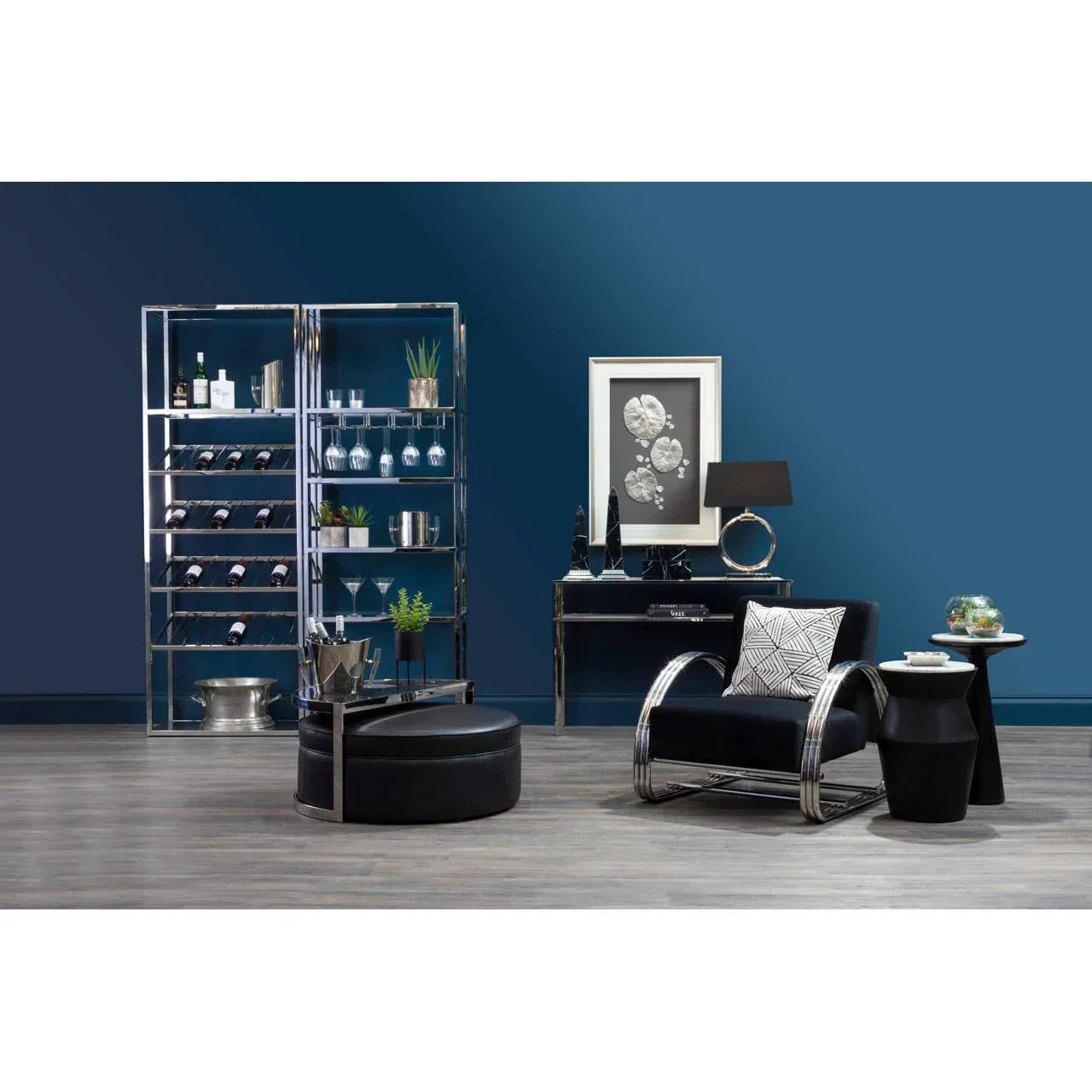 Modern home bar furniture set with chrome wine rack, black armchair, glass shelves and decor