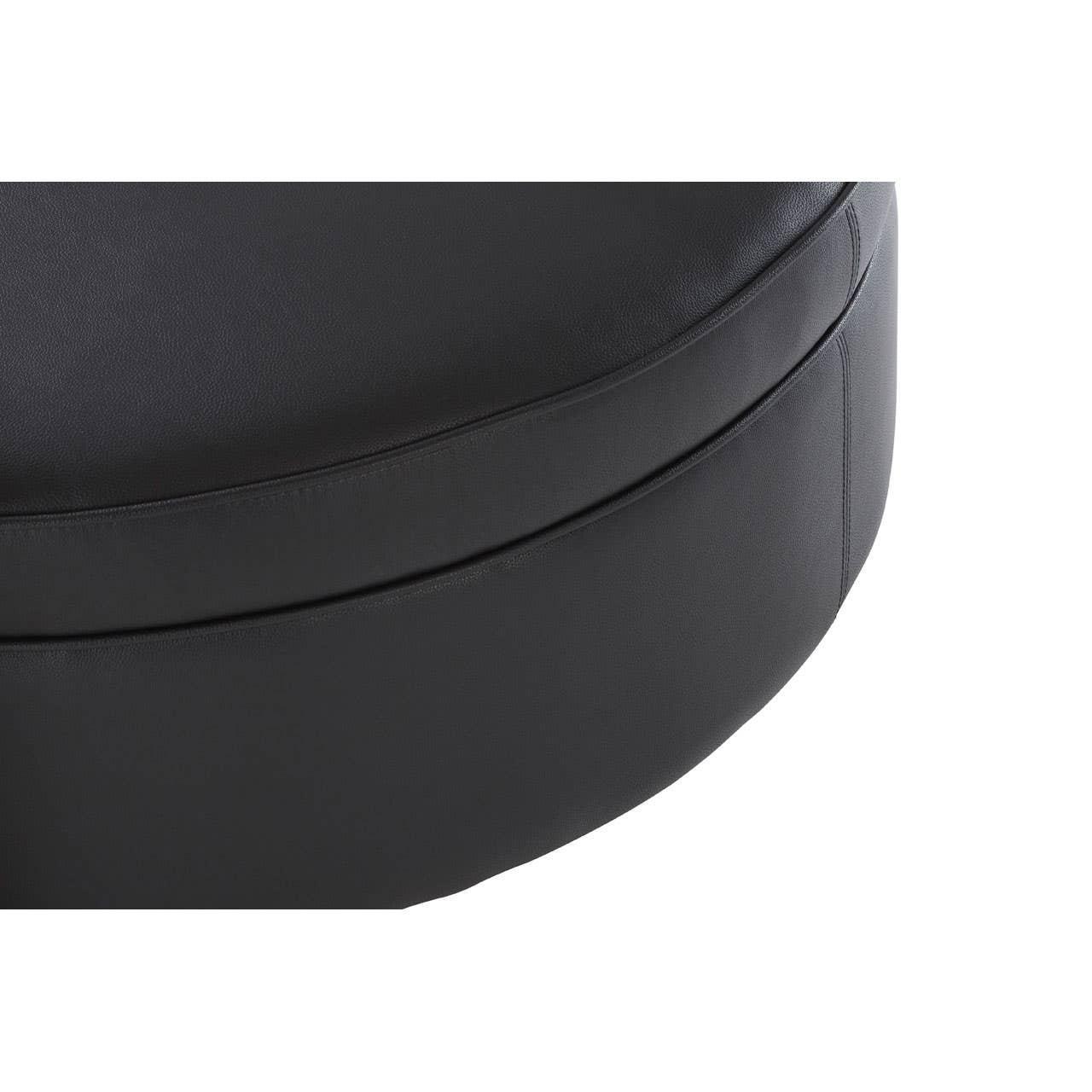 Closeup of round black leather ottoman with visible upholstery stitching