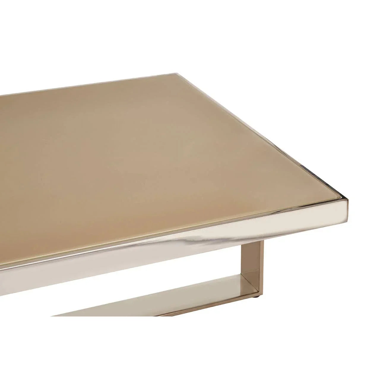 Beige glass coffee table with chrome frame close-up on corner and top surface