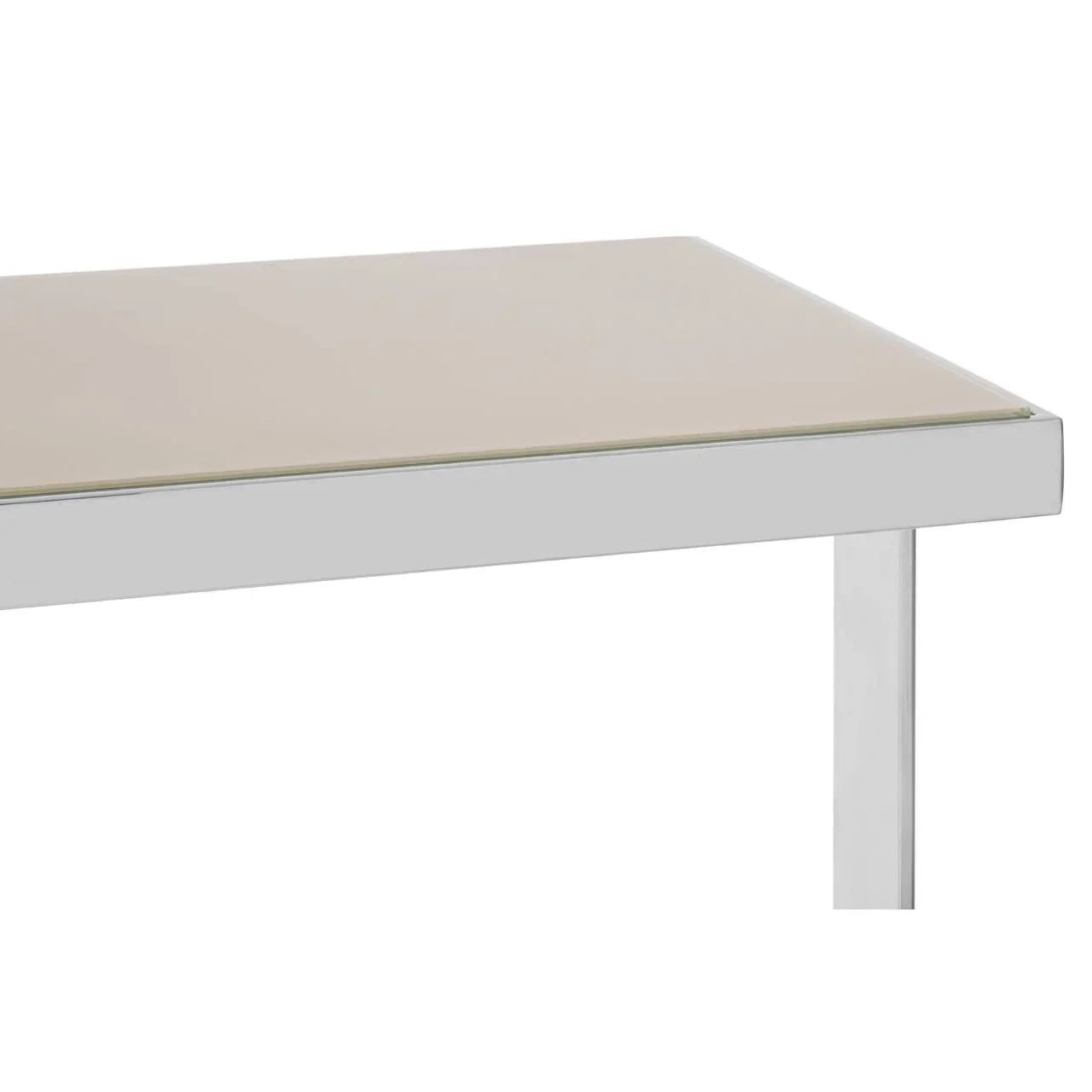 Close-up of glass dining table corner with white metal frame