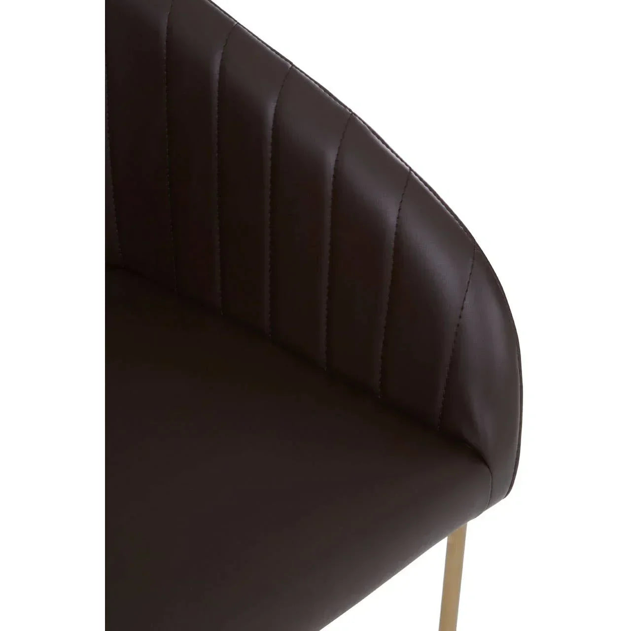 Close-up of brown faux leather dining chair with vertical stitched backrest and gold legs