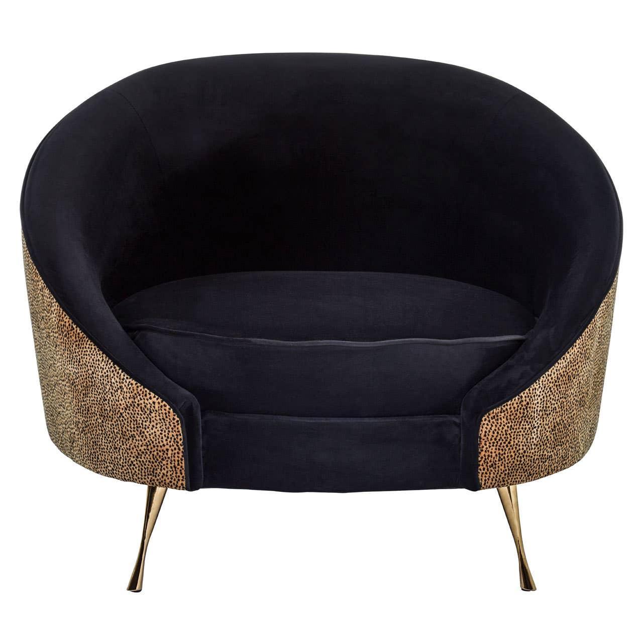 Black velvet accent chair with gold textured sides and slim gold legs, front view