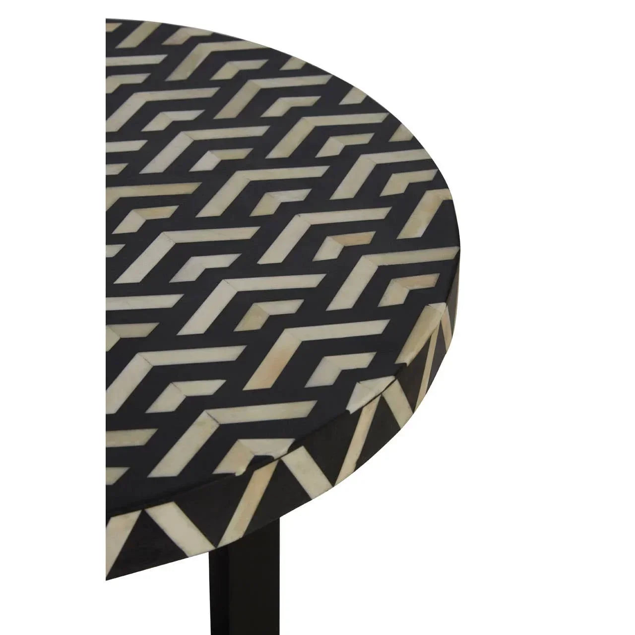 Round side table with black and cream geometric inlay pattern on top and edge