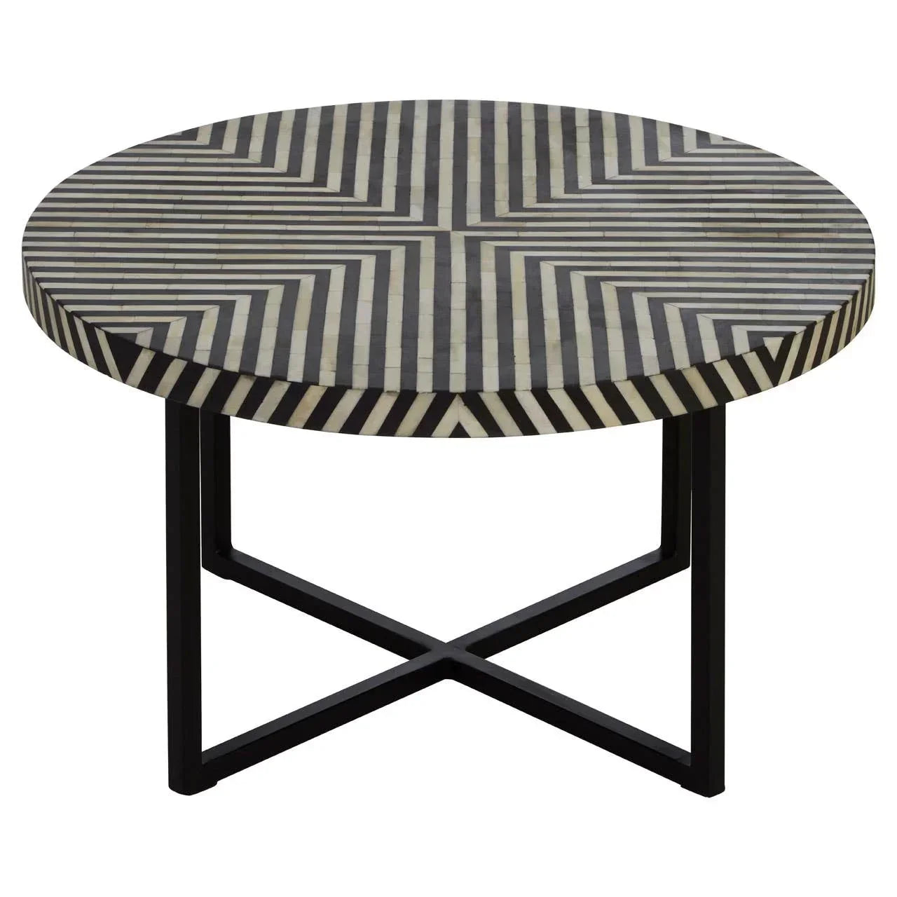 Round coffee table with black and white geometric patterned top and black metal legs