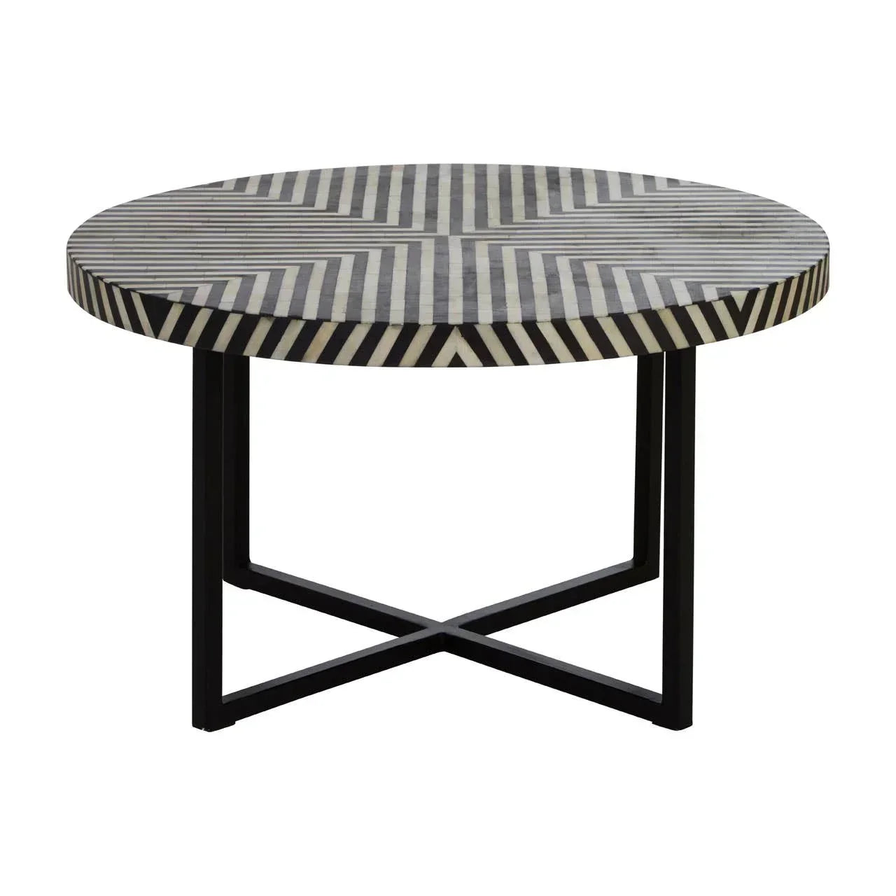 Round coffee table with black and white geometric patterned top and black metal legs