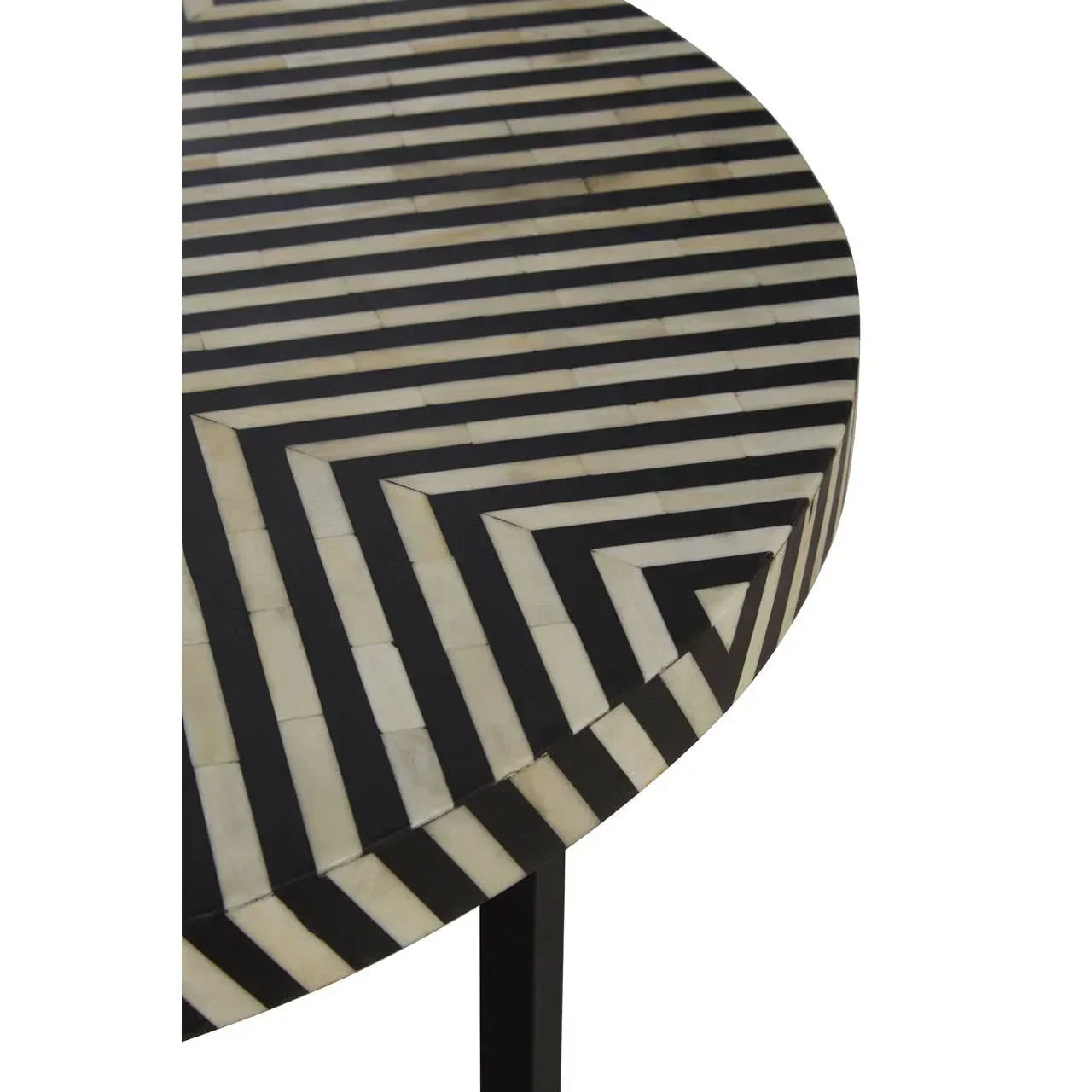 Round side table with black and white geometric striped inlay pattern, close up view