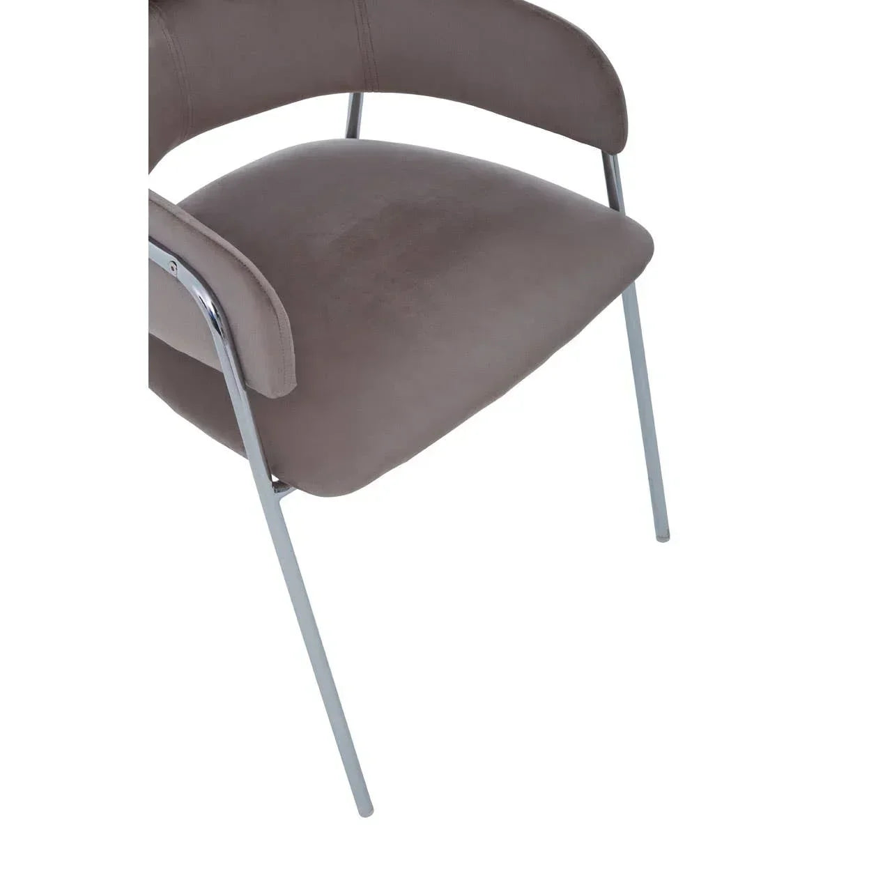 Grey velvet dining chair with chrome legs, angled view of seat and armrest