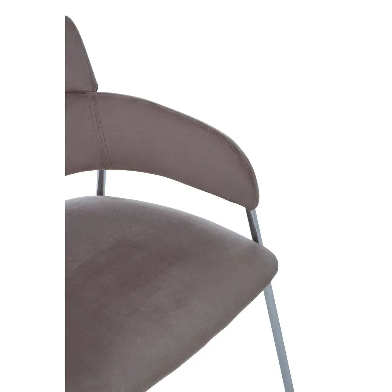 Taupe velvet dining chair with curved backrest and slim metal legs close-up