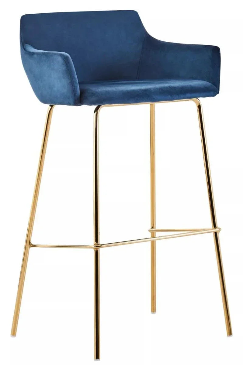Blue velvet bar stool with gold metal legs and curved armrests, front angle view